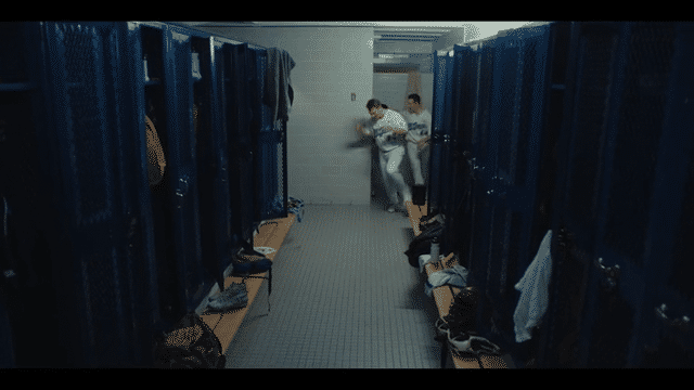 EPIC QUITSD MGY(CR) Final(OneShow)-low (3) Interior high school locker room with team celebrating